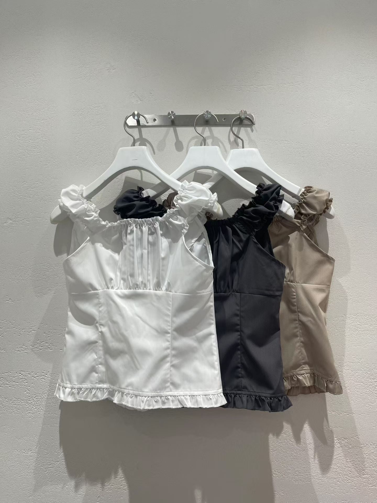 Chrome Button Ruffle Blouse